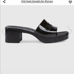 Gently worn rubber Gucci platform slides black